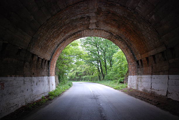 istock Light on the end of tunnel 507898782