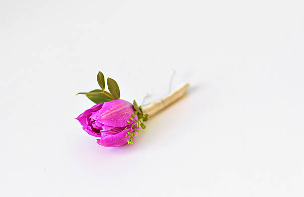 istock Spring purple tulip buttonhole for groom 507899224