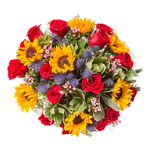 Sunflowers and big red roses in a wedding arrangement