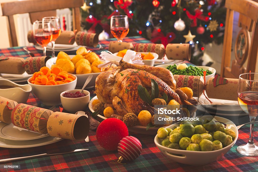 Christmas Dinner Is Served A traditional Christmas dinner. Christmas Stock Photo