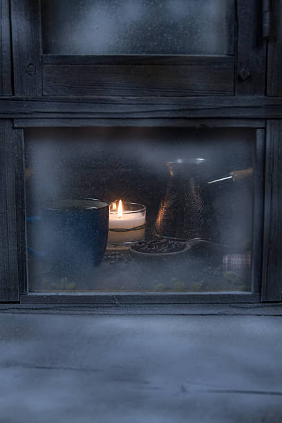istock Winter window. Cozy room. Candlesticks on a windowsill. 507902556