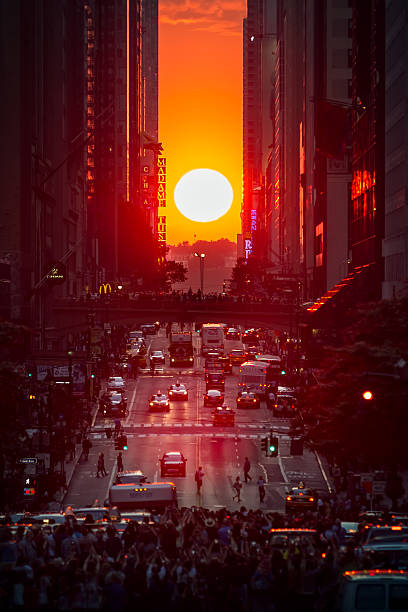 Manhattanhenge Manhattanhenge - Manhattan,New York,NY,USA on July 11 2014. Photo: Eduard Moldoveanu Photography 42nd street photos stock pictures, royalty-free photos & images