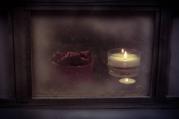 istock Winter window. Cozy room. Candlesticks on a windowsill.  Valentine's day 507902768