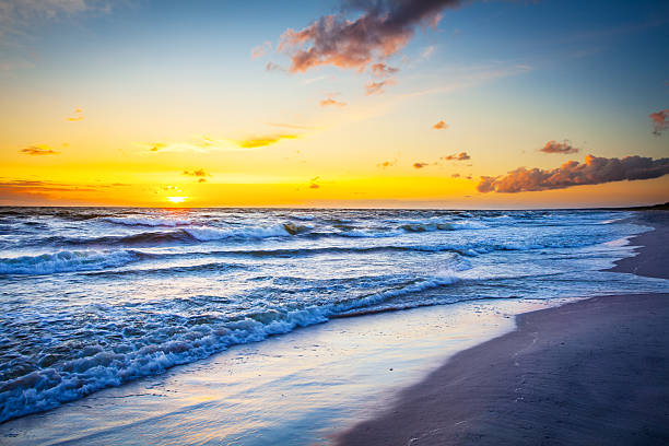 istock Sunset Over the Ocean - Sun, Sea Shore and Waves 507903235