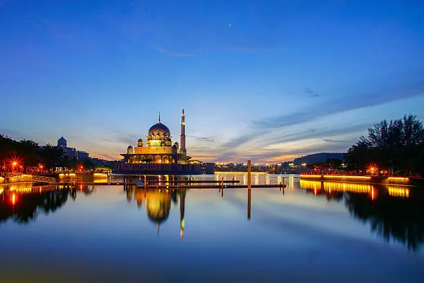 Beautiful reflection of Putra Mosque in the lake during blue hourBeautiful reflection of Putra Mosque in the lake during blue hour