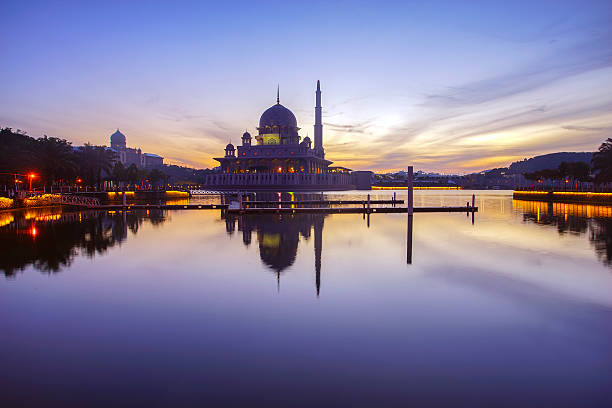 istock Beautiful reflection of Putra Mosque in lake during blue hour 507906708