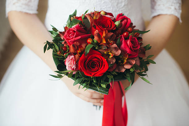 istock bridal bouquet of red roses 507907826