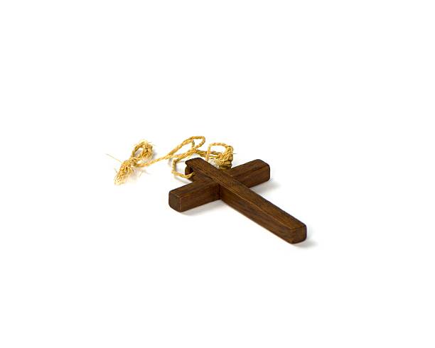 istock Wooden cross isolated on white background 507907858