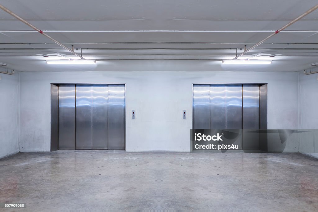 Two large freight elevators in modern building Two large freight elevators in modern building. Can be office, school, hospital, Shopping plaza, mega store or factory Architecture Stock Photo