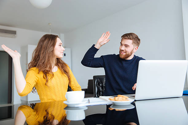 istock Couple giving five sign at home 507909330