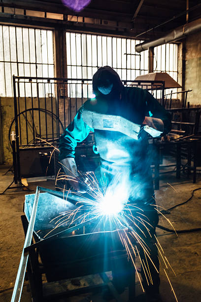 istock Craftsman welder  at work in a small factory 507910600