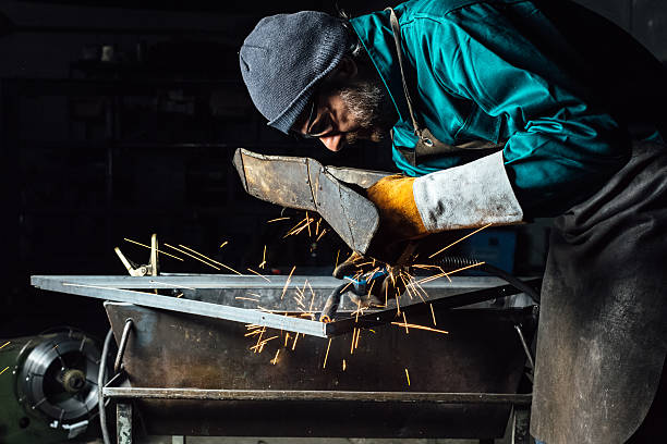 istock Craftsman welder  at work in a small factory 507910626