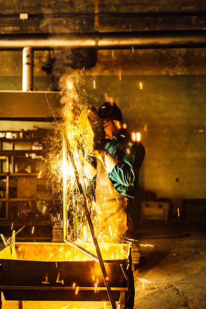 istock Craftsman welder  at work in a small factory 507910912