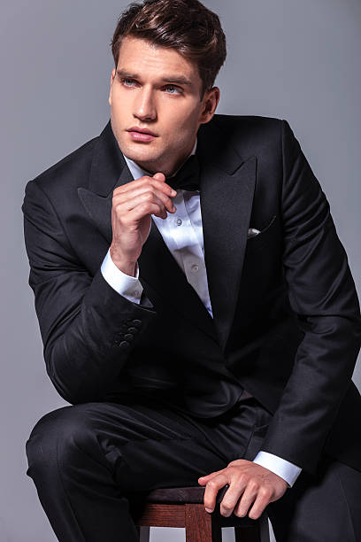 istock Pensive young business man looking up 507912286