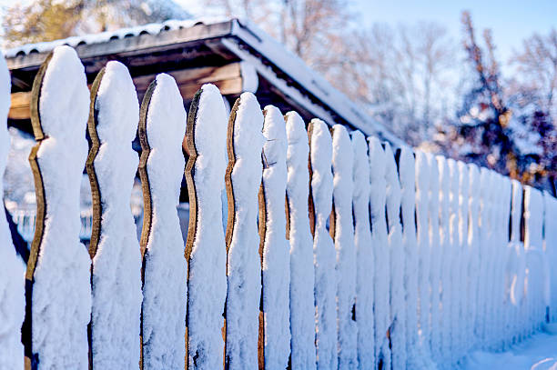 istock Snow Covered Wooden Fence 507912414