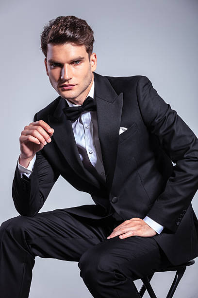 istock young business man sitting on a chair. 507913372