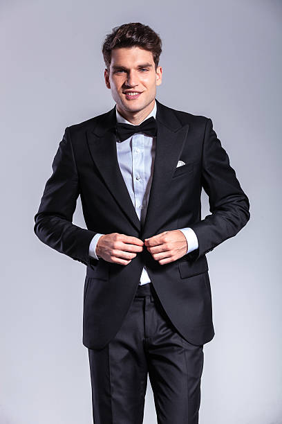 istock Happy young business man closing his jacket 507914214
