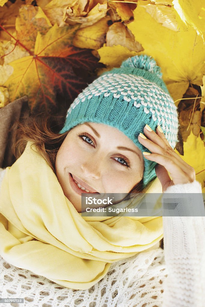 Happy beautiful woman in autumnal park Happy beautiful woman outside Autumn Stock Photo