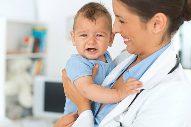 istock Cute baby boy at doctor's office. 507920169