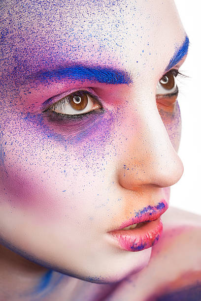 istock beautiful young woman with creative make-up 507922457