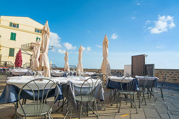 outdoor restaurant by Alghero promenade