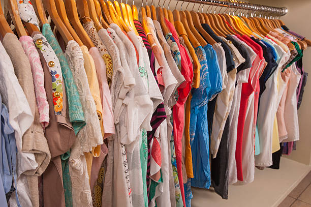 istock Womens clothes hanging on rail 507923693