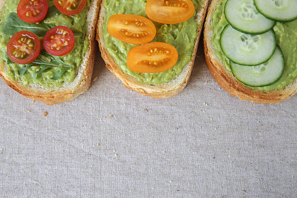 istock Green sourdough open face sandwiches toast 507953482