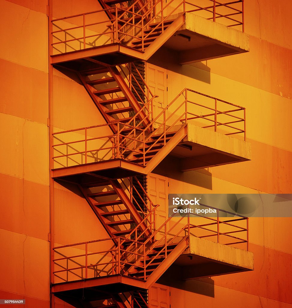 Fire escape building vibrant Fire escape building vibrant in Thailand Apartment Stock Photo