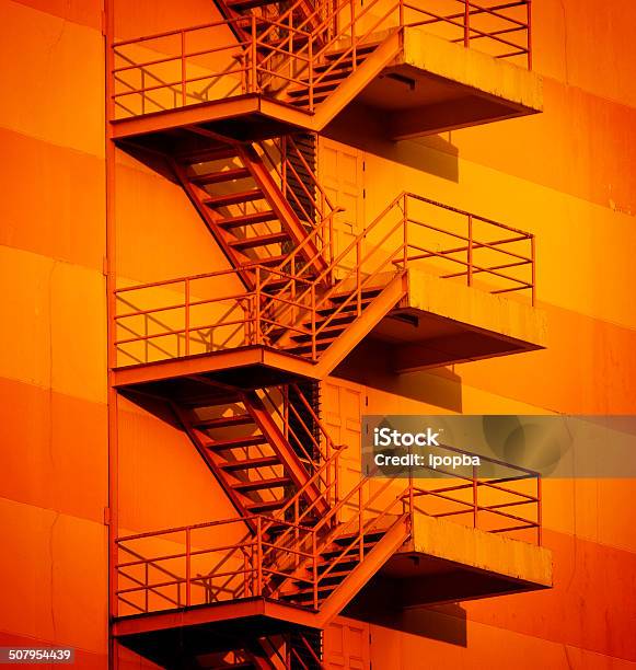 Fire Escape Building Vibrant Stock Photo - Download Image Now - Apartment, Architecture, Backgrounds