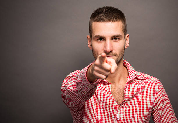istock Man pointing his finger at you 507955242