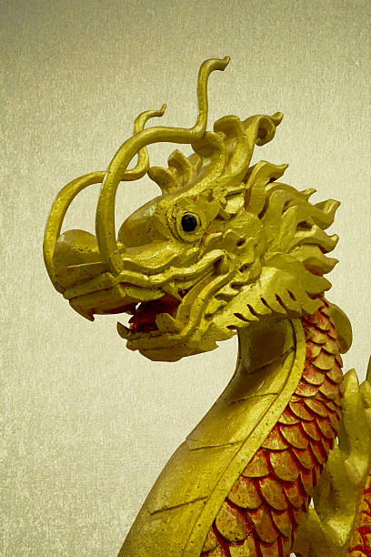 istock vintage picture golden Chinese dragon on isolate background 507955361
