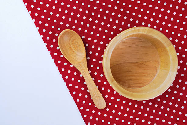 istock Wooden plate, tablecloth, spoon, fork on table background 507955591