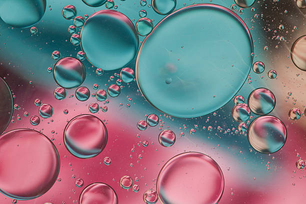 istock Abstract pattern of colored oil bubbles on water 507955691