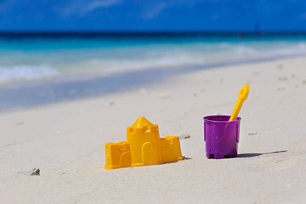 istock kids toys on tropical beach 507956153