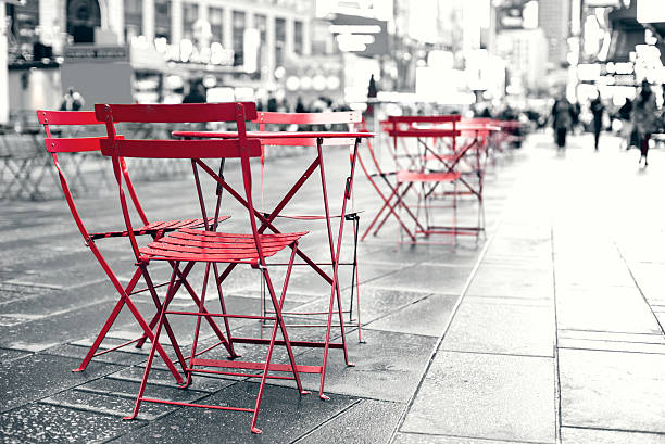 Seating area at plaza in busy Times Square NYC.