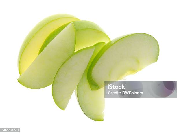 Green Apple Slices On White Background Top View Stock Photo - Download Image Now - Apple - Fruit, Green Color, Slice of Food