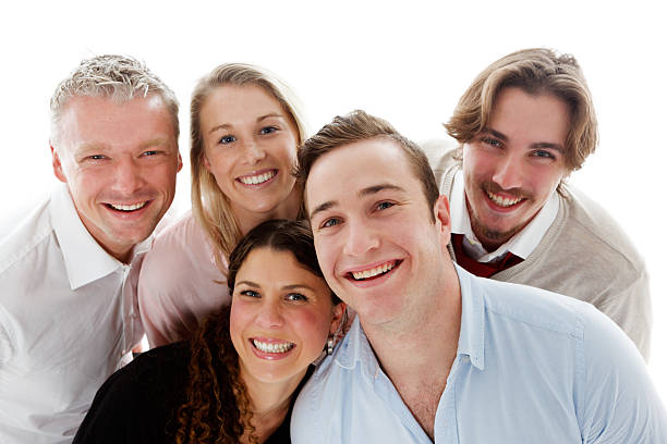 istock Five cheerful young people pose for a group portrait 507958347