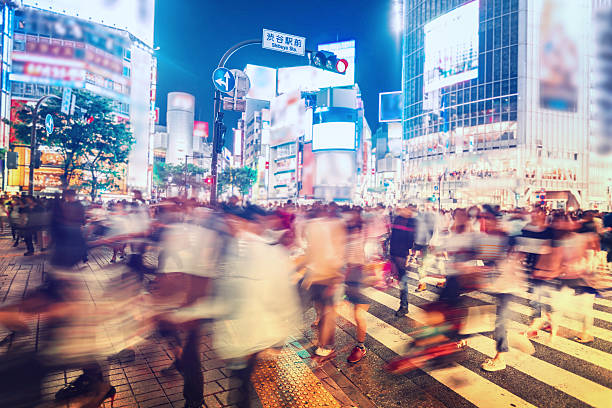 istock People and traffic cross the a busy city intersection 507958621