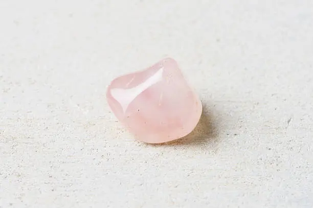 precious gemstone against background, Rose quartz