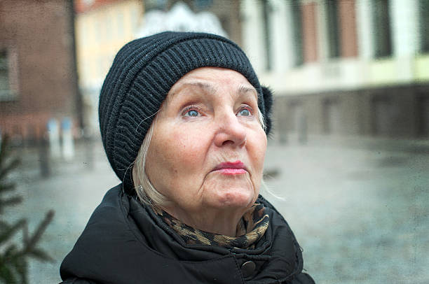 istock Elderly woman looking up 507958933