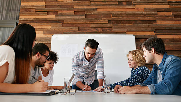 istock Group of colleagues having a brainstorming session 507959096