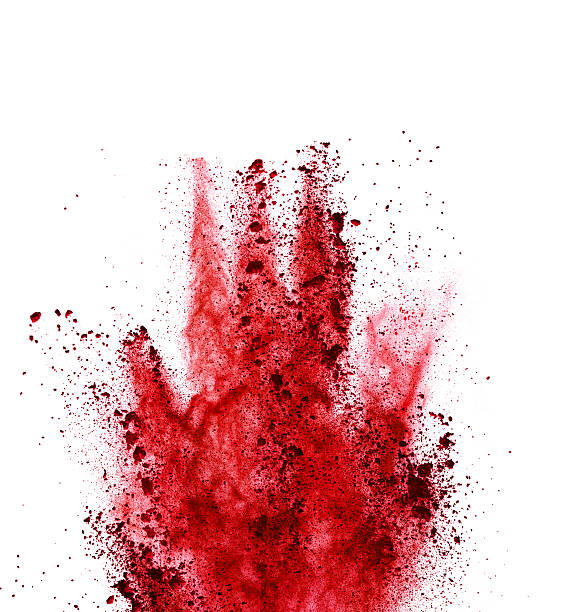 istock Explosion of red powder on white background 507959428
