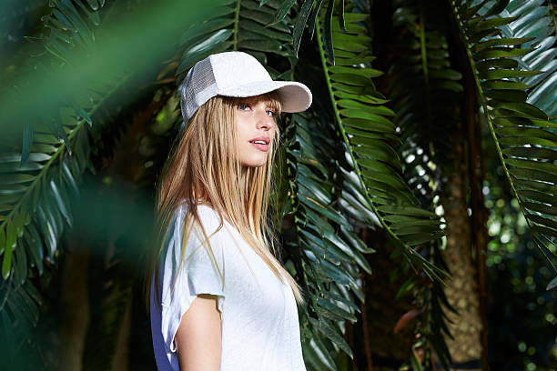 Gorgeous woman Gorgeous young blond woman in white cap white cap stock pictures, royalty-free photos & images
