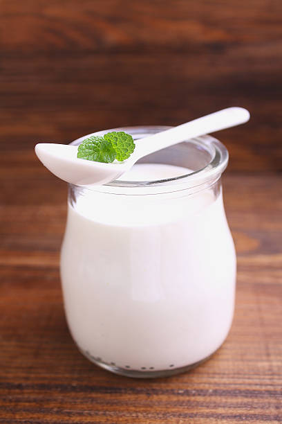 istock jar of yogurt and a spoon 507966000