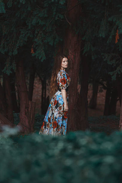 istock Pretty Young Boho Woman Standing in Forest 507966004