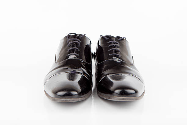 Women's suede shoe on white background. Woman's shoe. Feminine fashion. Fashion collection item. Design and fashion show. Party shoes.