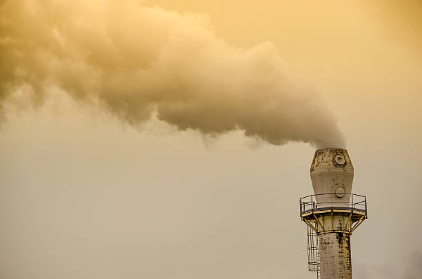 istock Yellow smoke from factory pipe 507969800