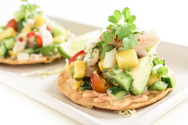 Fish Ceviche Tostada Fish ceviche tostada on white background seviche photos stock pictures, royalty-free photos & images