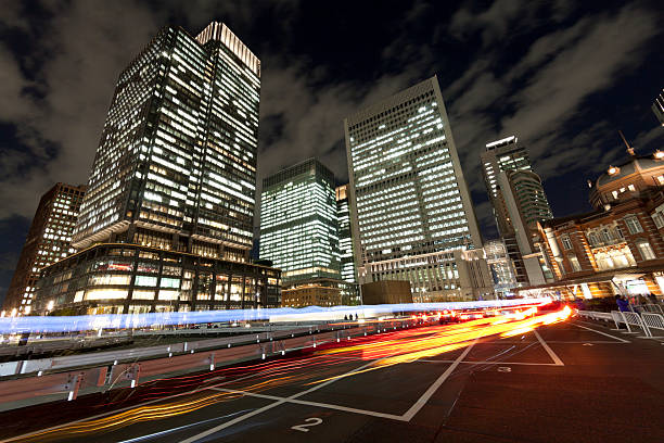 istock Tokyo Office Buildings and traffic at Night 507983061