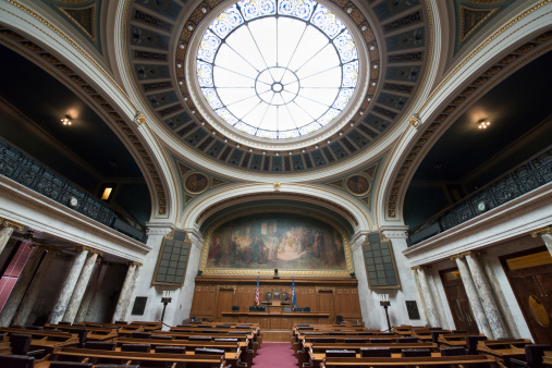 Interior photograph of the architecture of the State Capitol, in Madison, Wisconsin. Inside the chambers of House of Representatives.